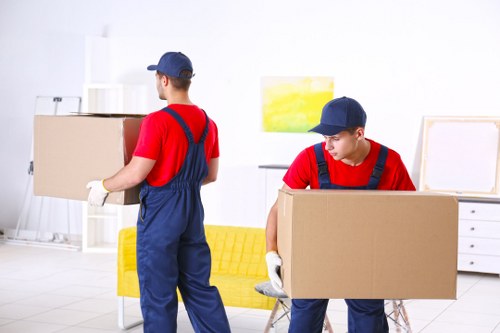 Man and van in Harringay loading furniture into a moving van