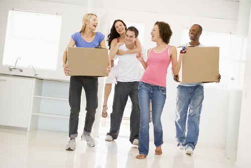 Professional office relocation planning in Harringay with moving boxes and workspace setup