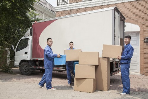 Removal van and moving team in Harringay on a residential street