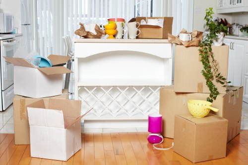 Commercial movers handling office equipment and furniture during a Harringay relocation