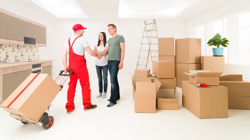 Moving team loading boxes for house removals in Harringay